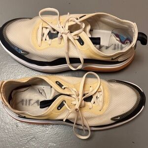 Nike Women's Cream and Black Low-Top Sneakers